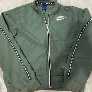 Greenish Nike wind breaker